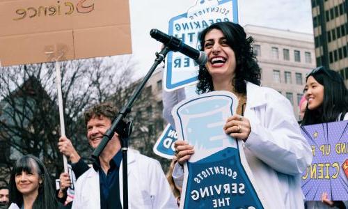 Maryam Zaringhalam speaks at a science march 